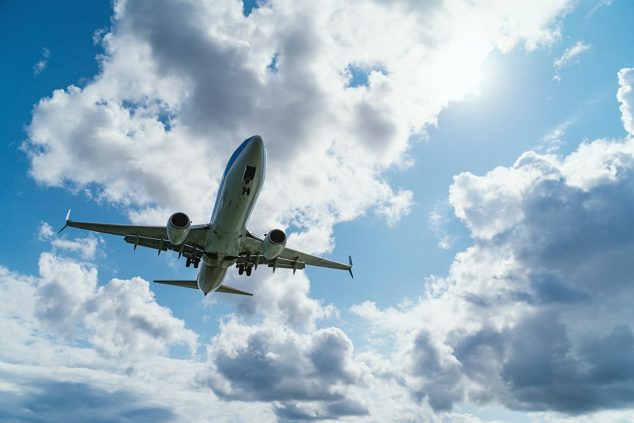 Airliner climbing into a blue sky